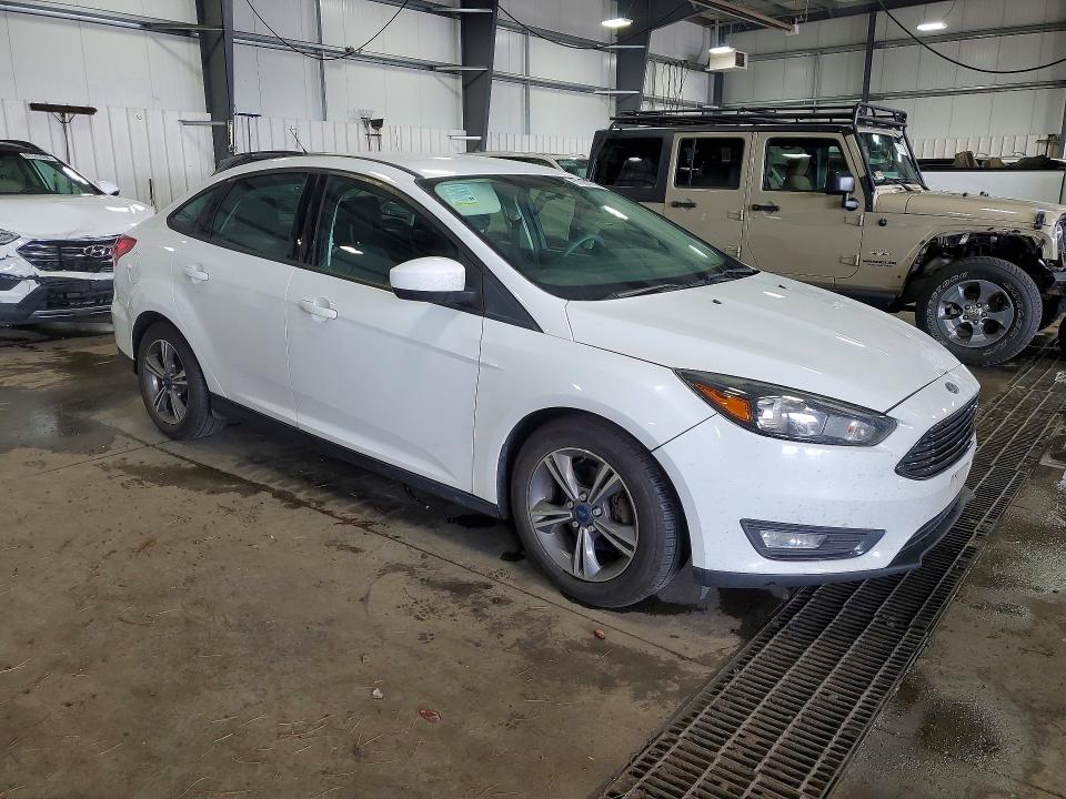 Photo 4 from auction – 2018 FORD FOCUS with VIN 1FADP3FEXJL233312