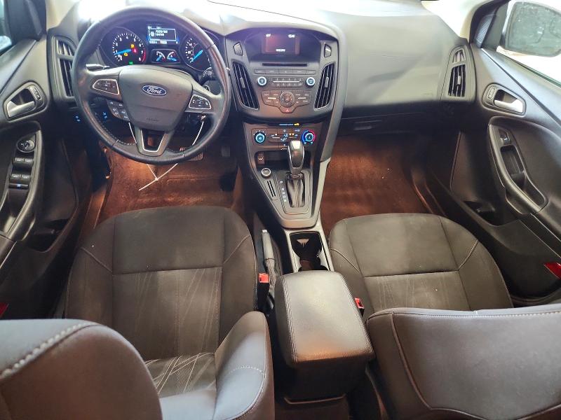 Photo 8 from auction – 2015 FORD FOCUS with VIN 1FADP3K21FL304447