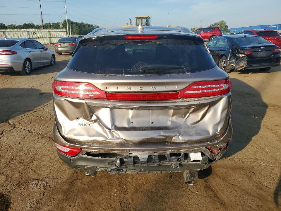 Снимка 6 от търг – 2019 LINCOLN MKC с VIN 5LMCJ2C97KUL09890