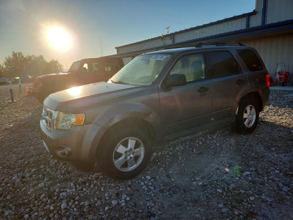 FORD ESCAPE 2011 with VIN 1FMCU9D76BKA62485 - Photo from auction