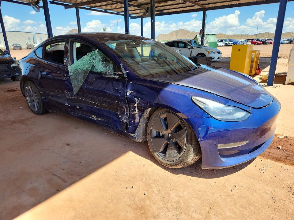 Foto 4 de la subasta – 2022 TESLA MODEL 3 con VIN 5YJ3E1EB8NF341007
