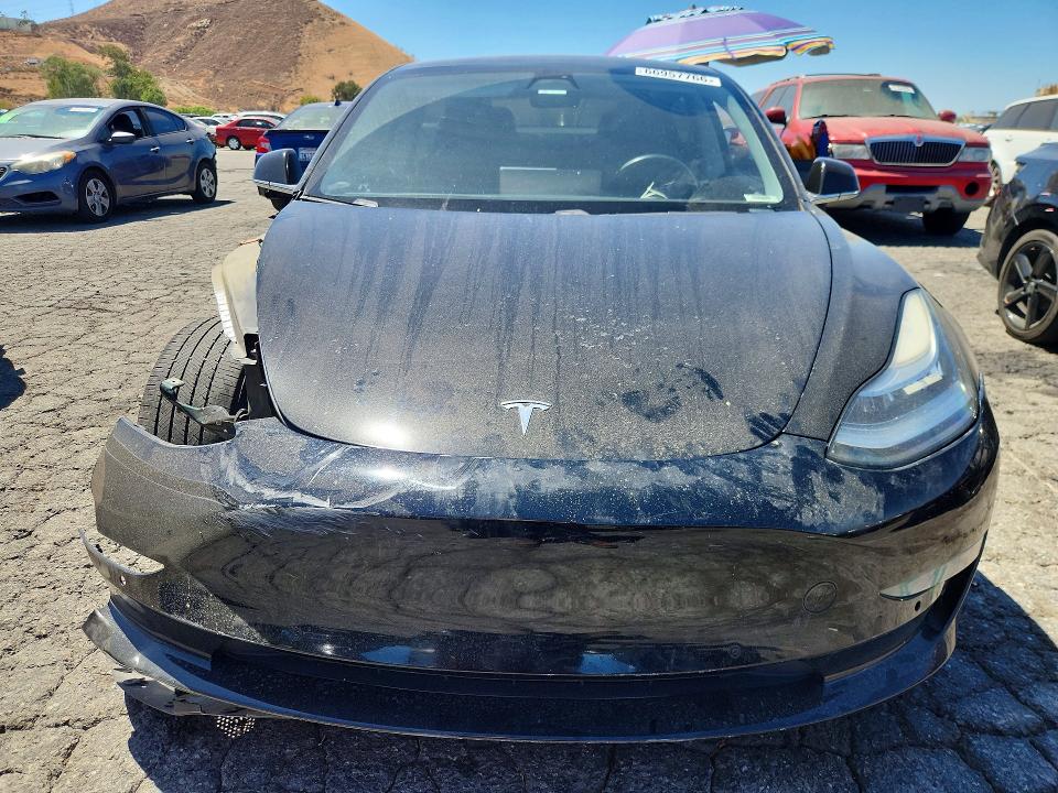 Photo 5 from auction – 2019 TESLA MODEL 3 with VIN 5YJ3E1EB7KF418459