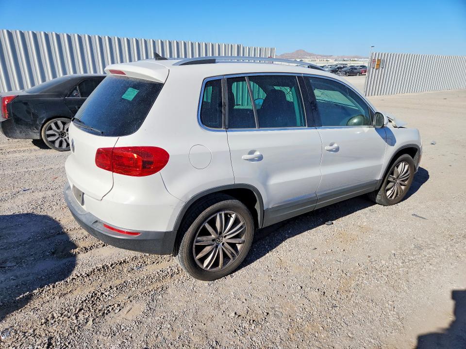 Photo 3 from auction – 2013 VOLKSWAGEN TIGUAN with VIN WVGAV3AX4DW601221