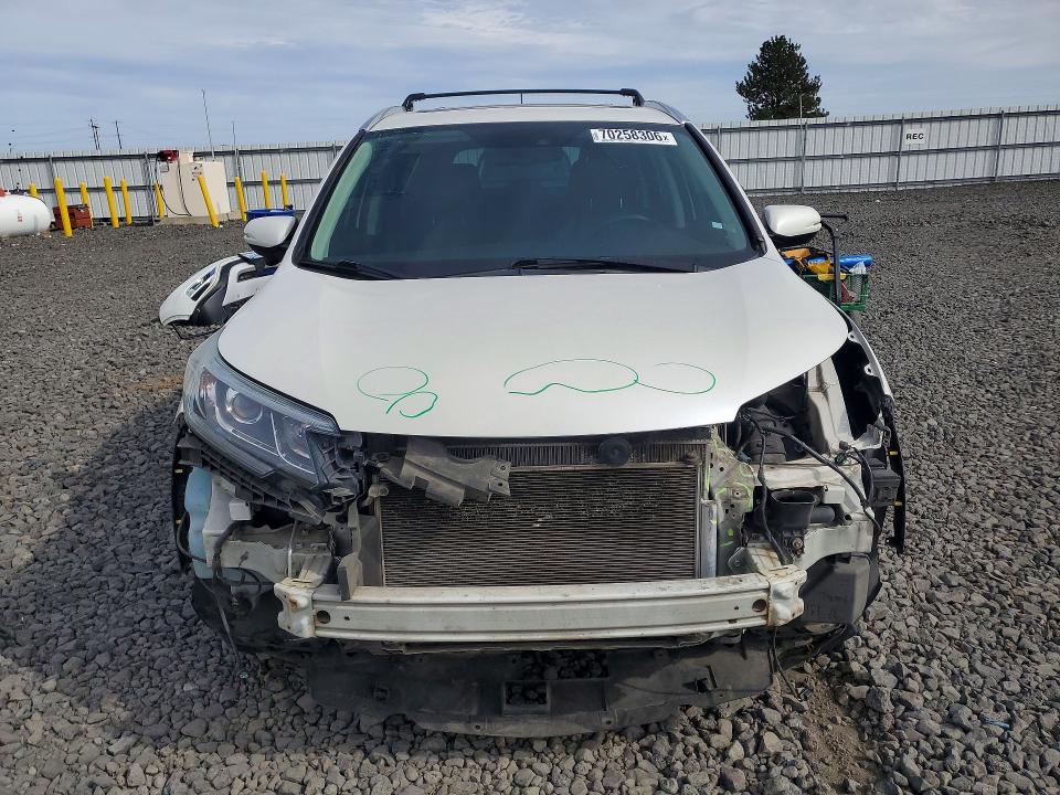 Photo 5 from auction – 2015 HONDA CR-V with VIN 5J6RM4H97FL018230