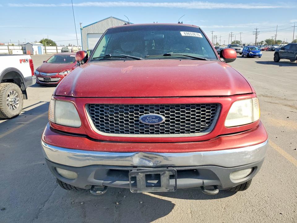 Photo 5 from auction – 2001 FORD F150 with VIN 1FTRX18W31NA88984