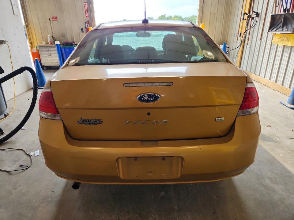 Снимка 6 от търг – 2009 FORD FOCUS с VIN 1FAHP35N49W105564