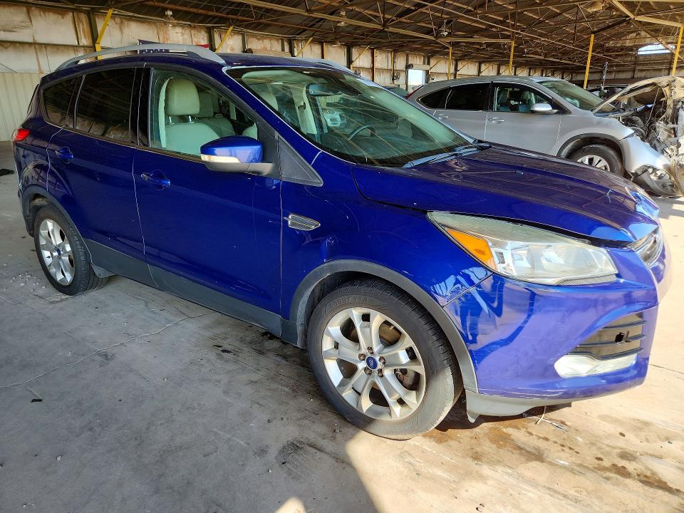 Photo 4 from auction – 2016 FORD ESCAPE with VIN 1FMCU9J96GUC16680