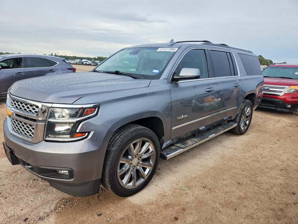 CHEVROLET SUBURBAN 2019 with VIN 1GNSCHKC1KR262282 - Photo from auction