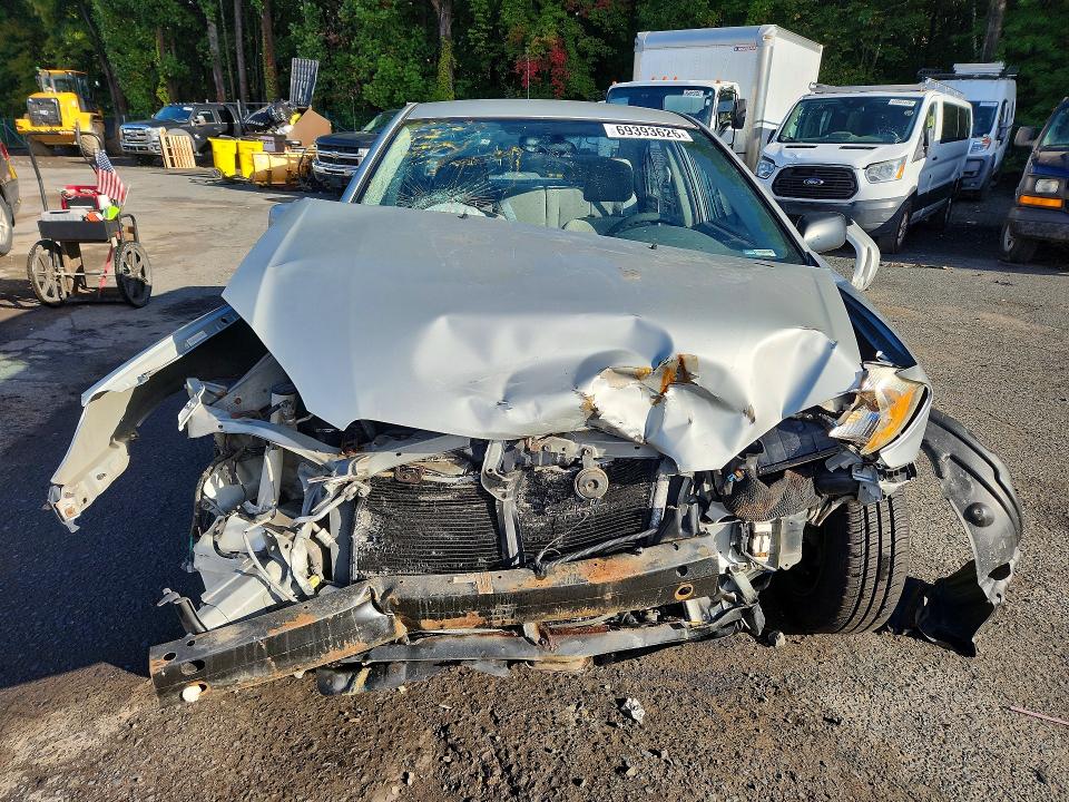 Снимка 5 от търг – 2004 TOYOTA COROLLA с VIN 2T1BR32E04C315076