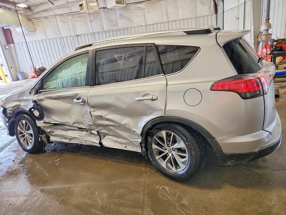 Photo 2 from auction – 2016 TOYOTA RAV4 HV with VIN JTMRJREV4GD039545
