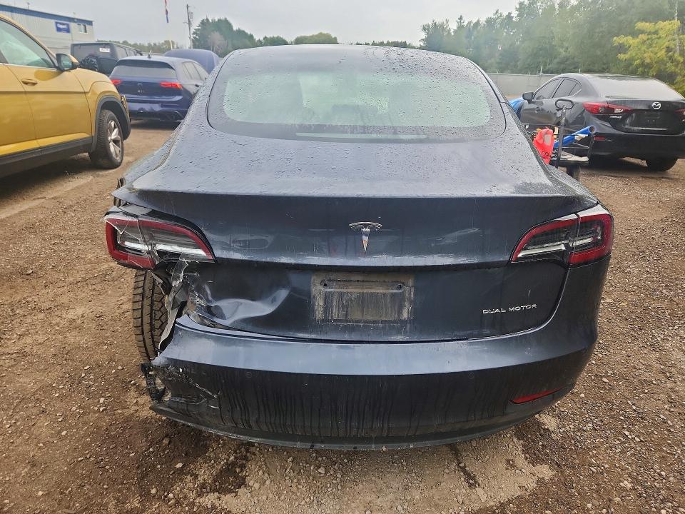 Снимка 6 от търг – 2022 TESLA MODEL 3 с VIN 5YJ3E1EB3NF274784