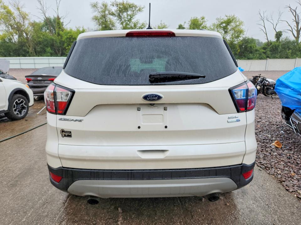 Снимка 6 от търг – 2018 FORD ESCAPE с VIN 1FMCU9HD6JUB38077