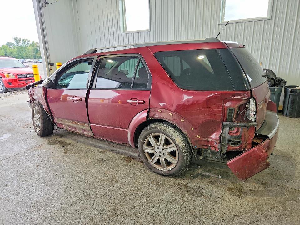 Снимка 2 от търг – 2008 FORD TAURUS X с VIN 1FMDK06W58GA01635