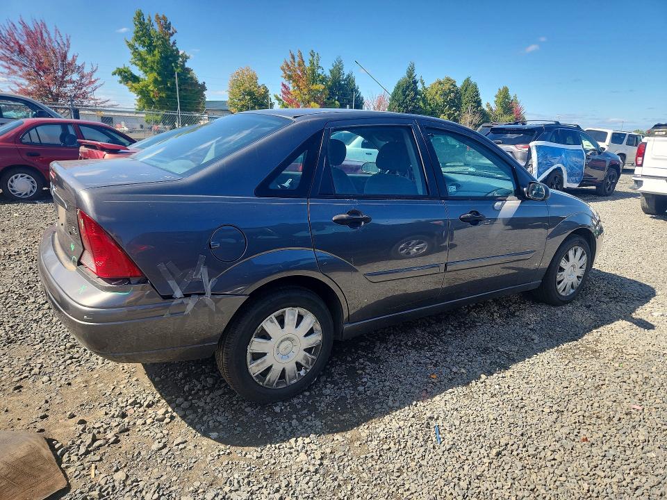 Photo 3 from auction – 2004 FORD FOCUS with VIN 1FAHP34394W149925