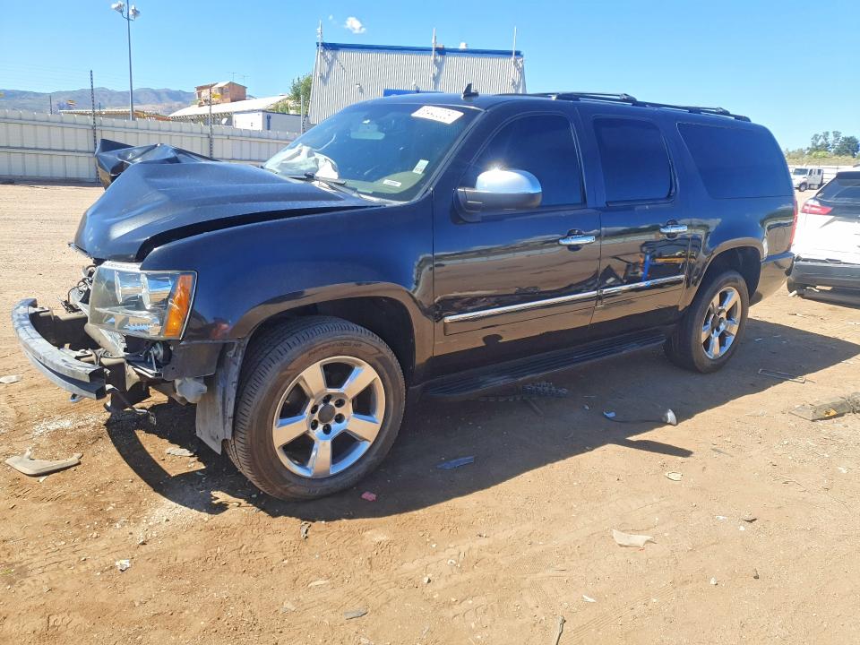 CHEVROLET SUBURBAN 2011 with VIN 1GNSKKE34BR182065 - Photo from auction