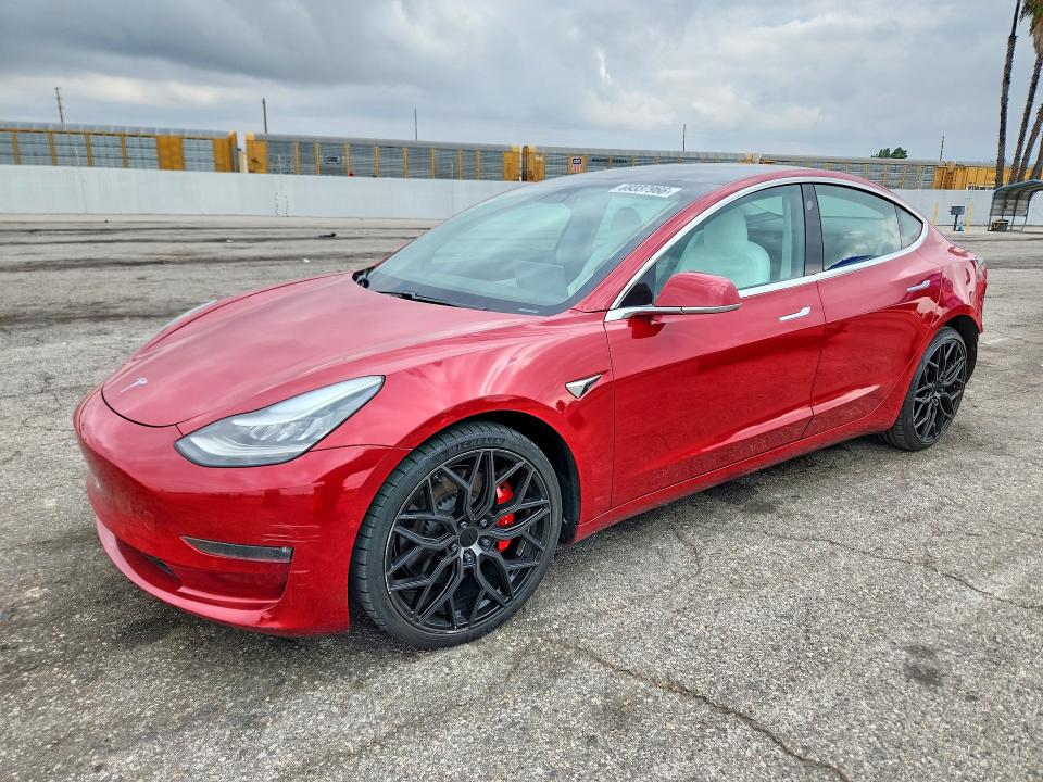 TESLA MODEL 3 2019 с VIN 5YJ3E1EB0KF477594 - Фото с аукциона