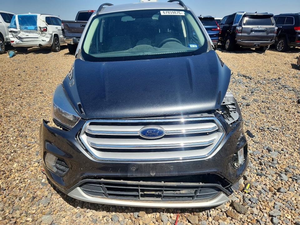 Photo 5 from auction – 2018 FORD ESCAPE with VIN 1FMCU9GD0JUB94565
