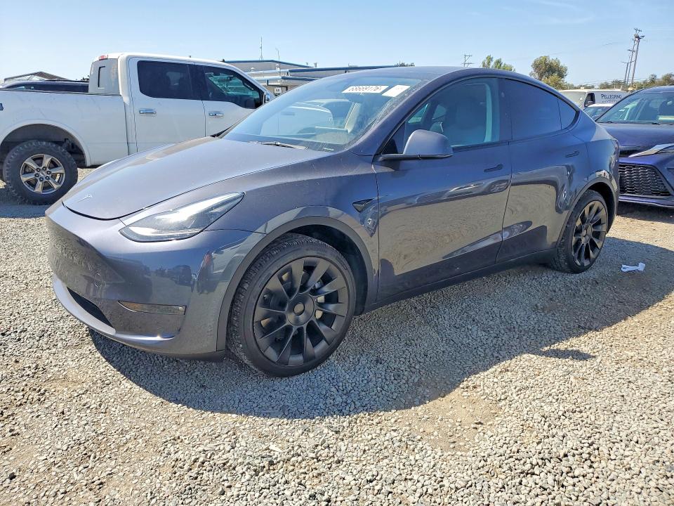 TESLA MODEL Y 2023 with VIN 7SAYGDEE0PF906867 - Photo from auction