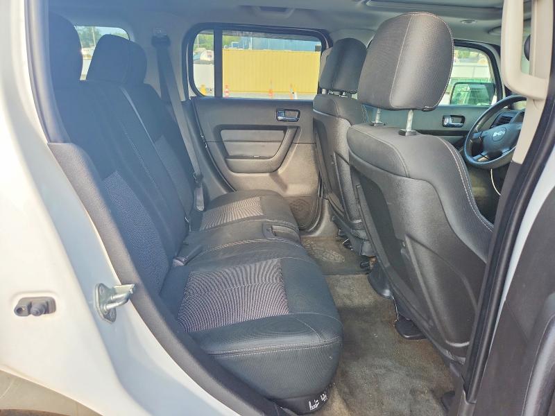 Photo 11 from auction – 2009 HUMMER H3 with VIN 5GTEN13E498124154