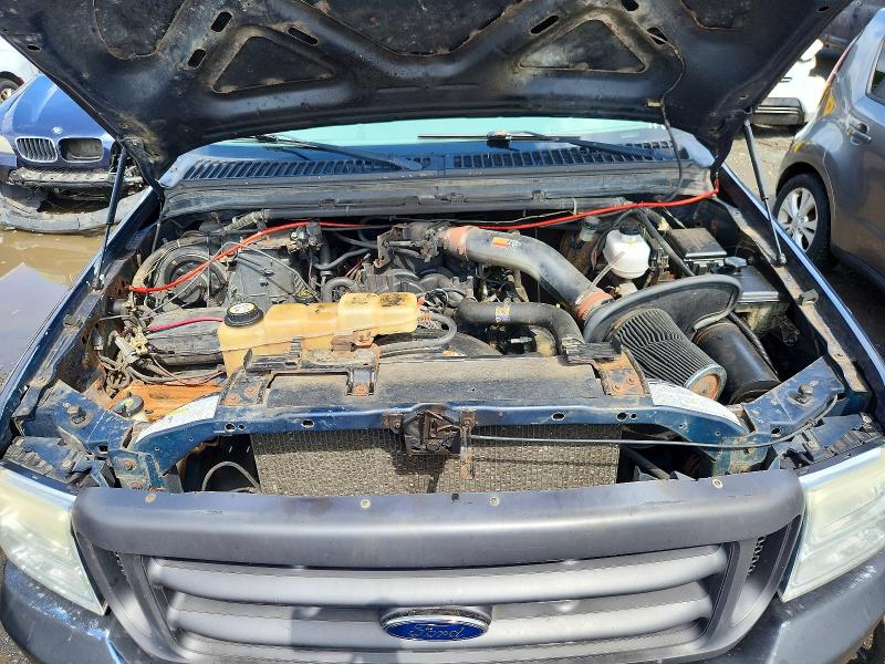 Снимка 11 от търг – 2001 FORD F250 с VIN 1FTNX21LX1EA44923