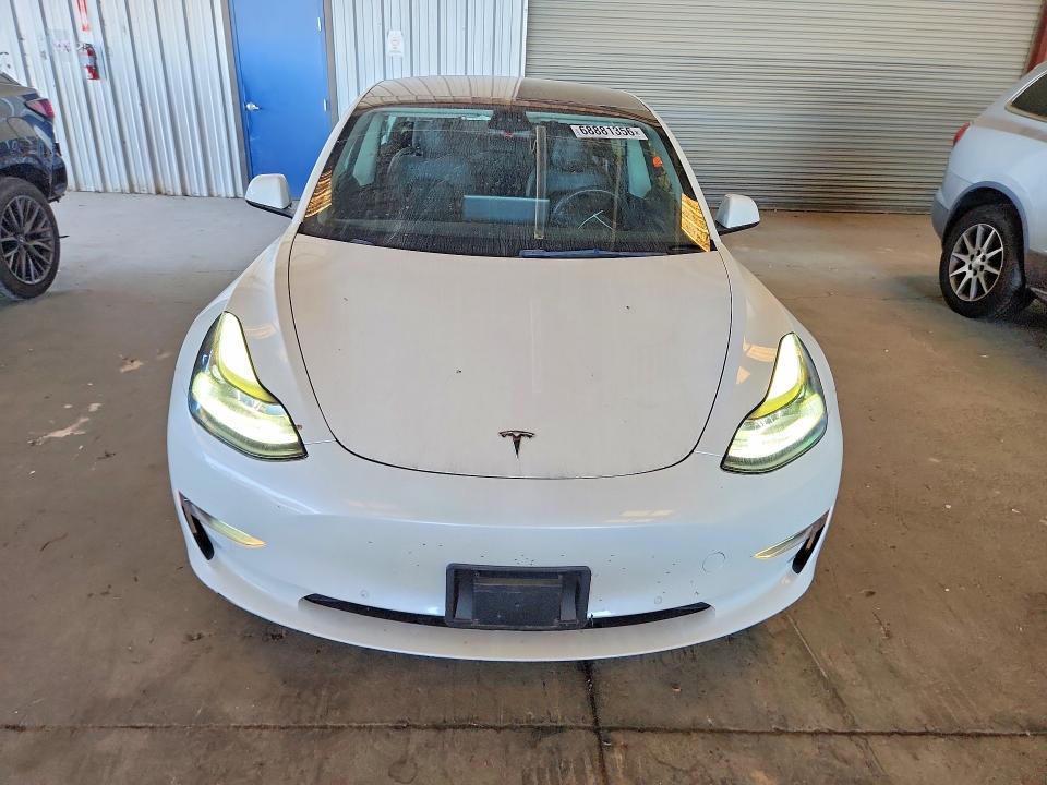 Фото 5 с аукциона – 2022 TESLA MODEL 3 с VIN 5YJ3E1EB9NF134142