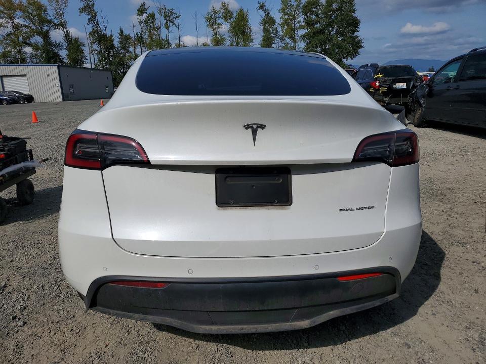 Photo 6 from auction – 2022 TESLA MODEL Y with VIN 7SAYGDEE8NF320477