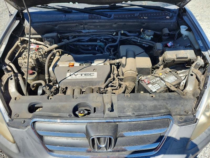 Photo 12 from auction – 2006 HONDA CR-V with VIN JHLRD68536C019490