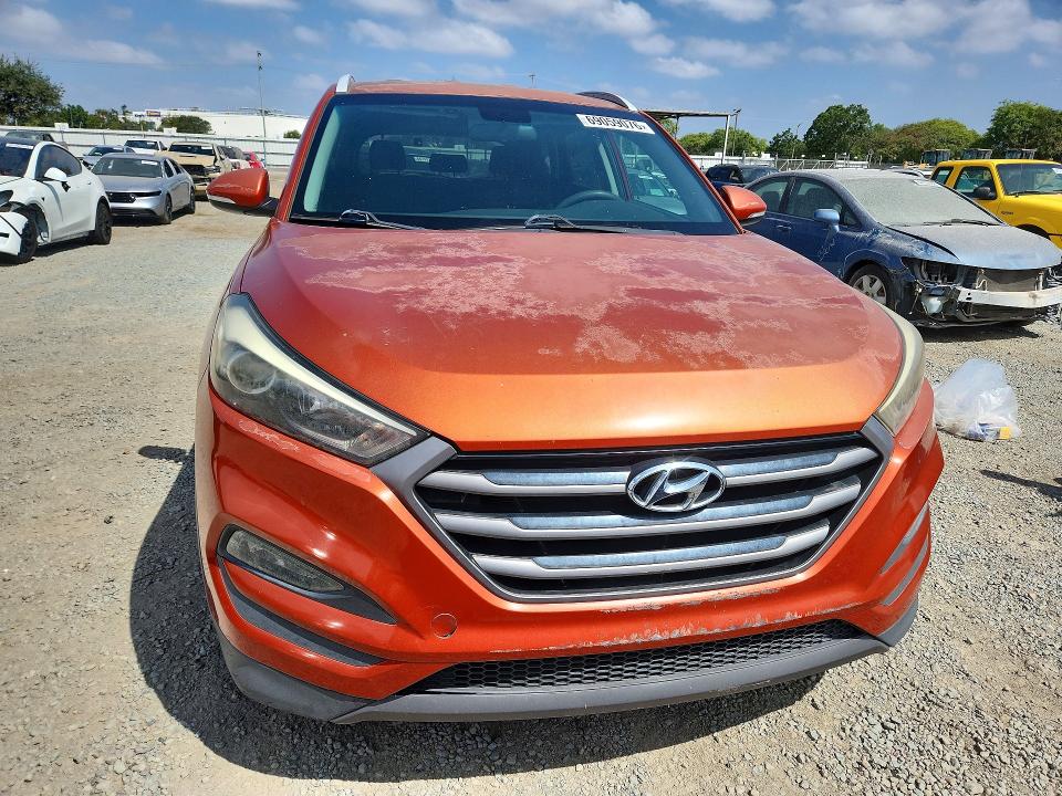 Photo 5 from auction – 2016 HYUNDAI TUCSON with VIN KM8J33A23GU028371