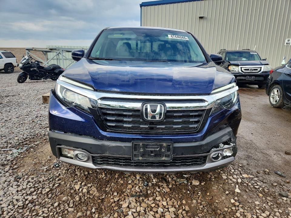 Photo 5 from auction – 2018 HONDA RIDGELINE with VIN 5FPYK3F70JB010699