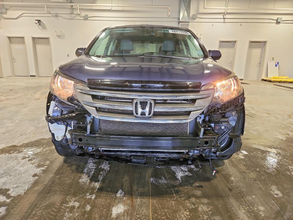 Photo 5 from auction – 2013 HONDA CR-V with VIN 2HKRM4H77DH110069