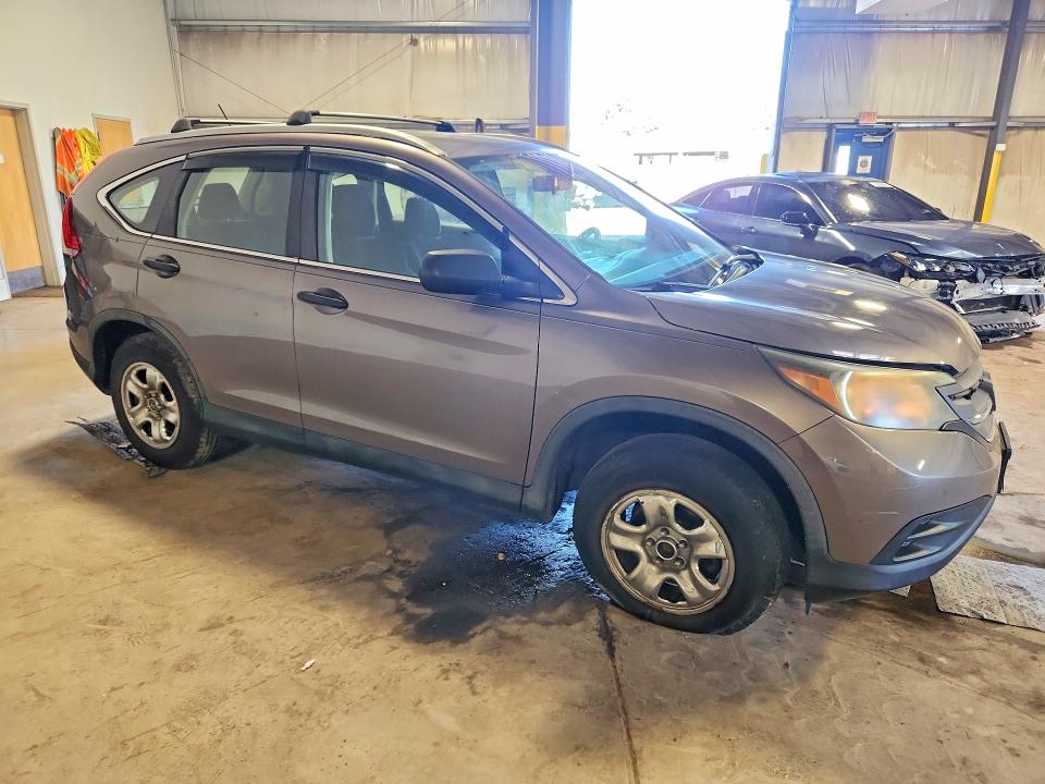 Photo 4 from auction – 2013 HONDA CR-V with VIN 5J6RM4H31DL050499