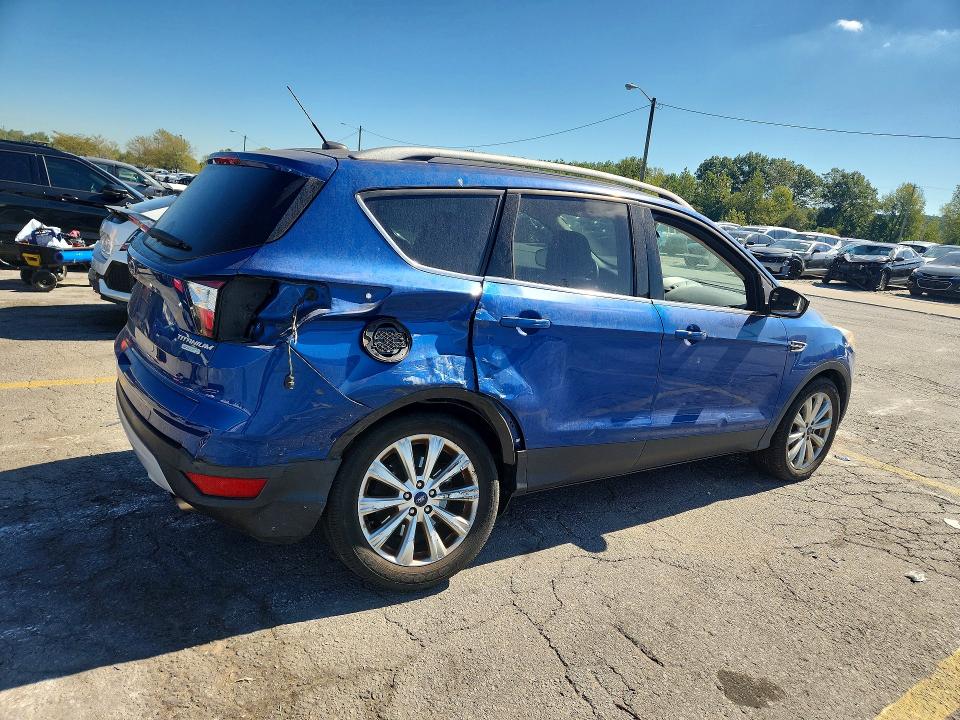 Photo 3 from auction – 2017 FORD ESCAPE with VIN 1FMCU0JD8HUE91338