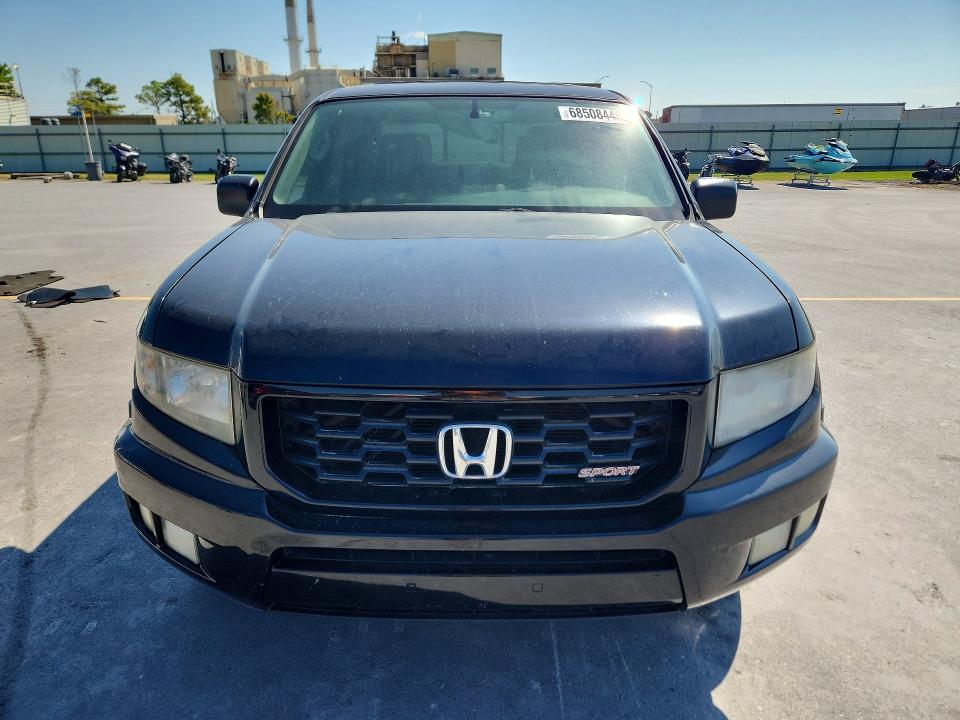Photo 5 from auction – 2013 HONDA RIDGELINE with VIN 5FPYK1F72DB018229