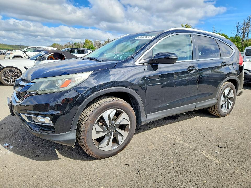 Photo 1 from auction – 2016 HONDA CR-V with VIN 5J6RM4H95GL098080