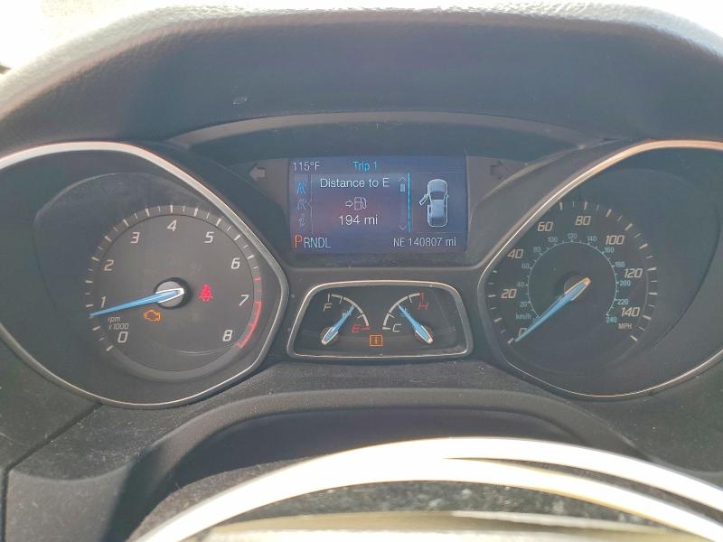 Photo 9 from auction – 2014 FORD FOCUS with VIN 1FADP3F29EL348740