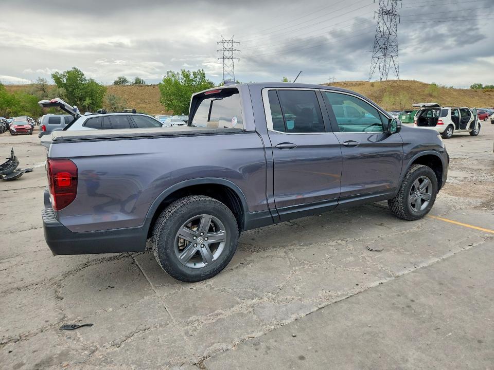 Photo 3 from auction – 2022 HONDA RIDGELINE with VIN 5FPYK3F52NB013060