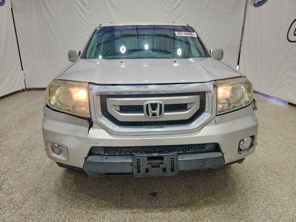 Photo 5 from auction – 2011 HONDA PILOT with VIN 5FNYF3H94BB045064