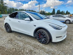 Zdjęcie 4 z aukcji – 2022 TESLA MODEL Y z VIN 7SAYGDEF2NF552825