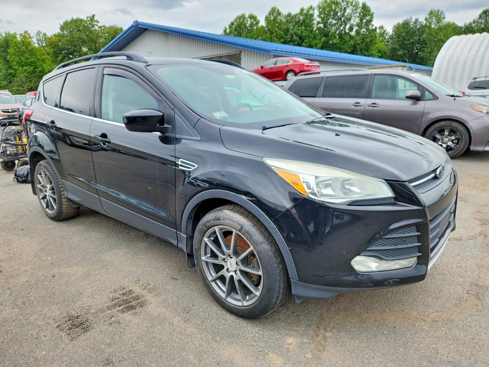 Photo 4 from auction – 2016 FORD ESCAPE with VIN 1FMCU9G99GUC31956