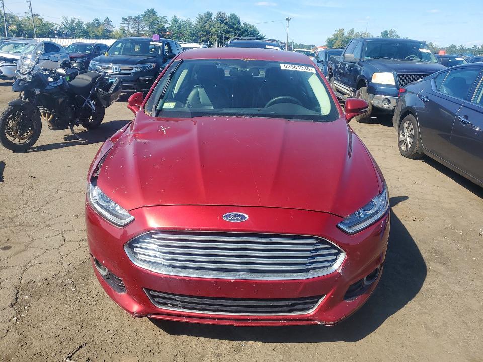 Photo 5 from auction – 2016 FORD FUSION with VIN 3FA6P0K91GR399678