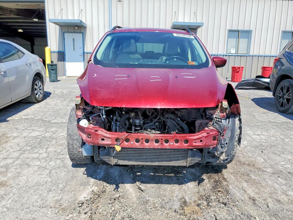 Снимка 5 от търг – 2016 FORD ESCAPE с VIN 1FMCU9G91GUC36102