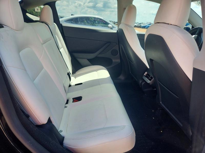 Снимка 10 от търг – 2023 TESLA MODEL Y с VIN 7SAYGDEF5PF870182