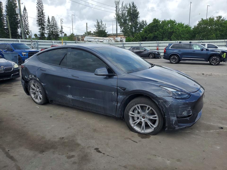 Снимка 4 от търг – 2023 TESLA MODEL Y с VIN 7SAYGDEEXPA197135