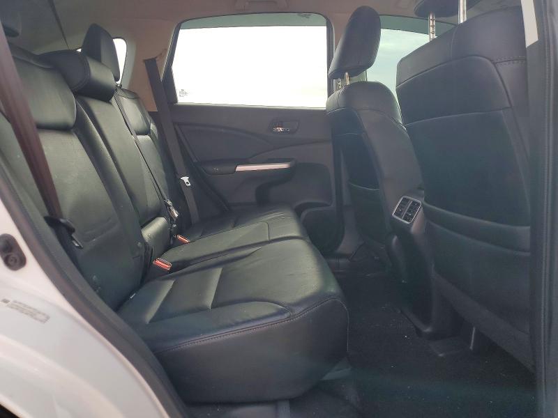 Photo 11 from auction – 2015 HONDA CR-V with VIN 5J6RM4H97FL018230