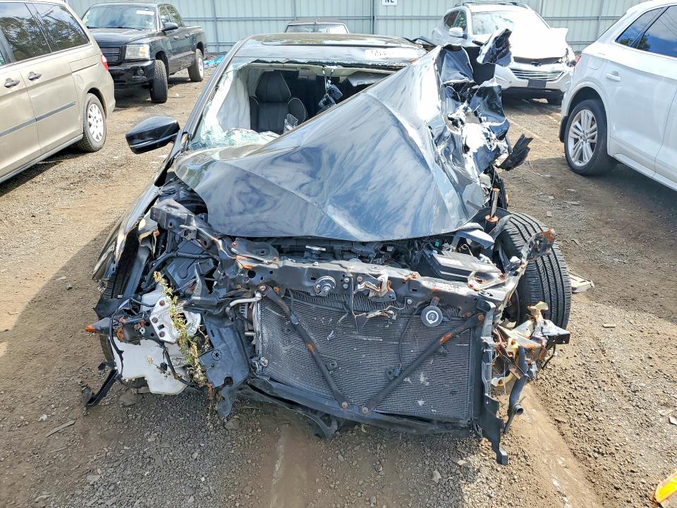 Photo 5 from auction – 2018 ACURA TLX with VIN 19UUB2F55JA001832