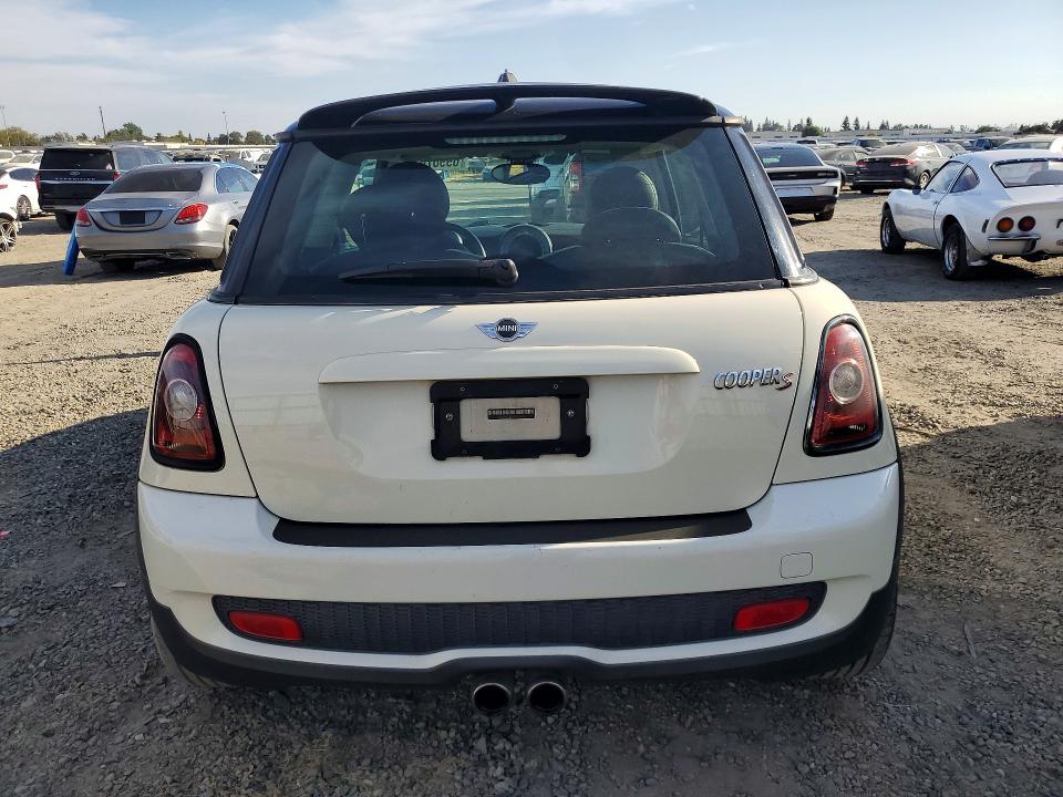 Photo 6 from auction – 2009 MINI COOPER with VIN WMWMF73509TW82631