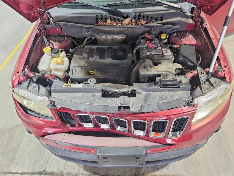 Photo 12 from auction – 2014 JEEP COMPASS with VIN 1C4NJDBBXED647059