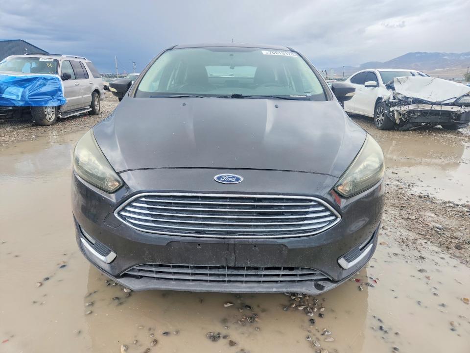 Photo 5 from auction – 2016 FORD FOCUS with VIN 1FADP3N21GL221520