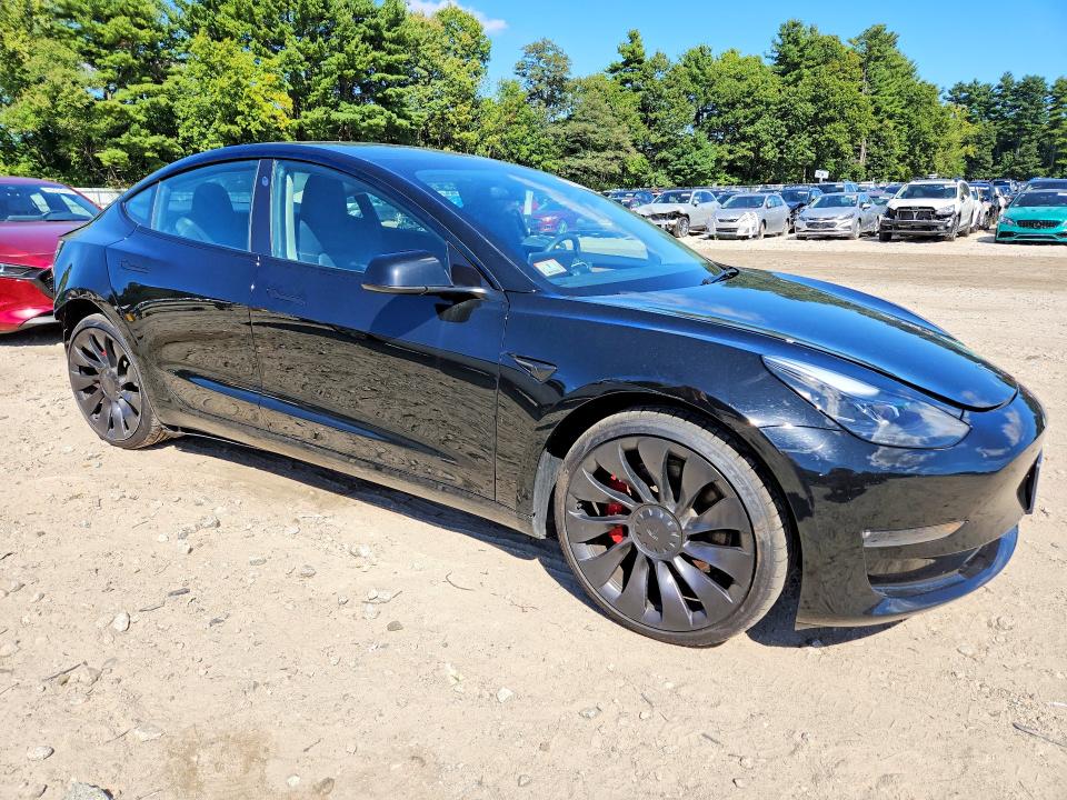 Photo 4 from auction – 2023 TESLA MODEL 3 with VIN 5YJ3E1EC3PF680382