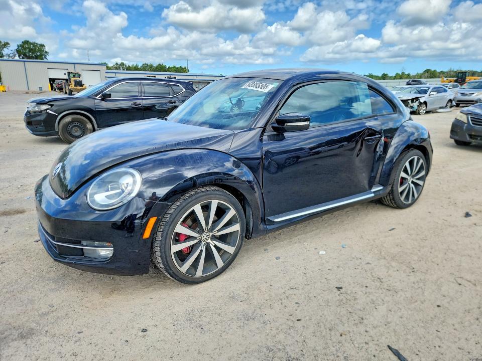VOLKSWAGEN BEETLE 2012 с VIN 3VWVA7ATXCM660520 - Снимка от търг